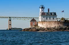 Rose Island Lighthouse in Front of Newport Bridge in Rhode Islan